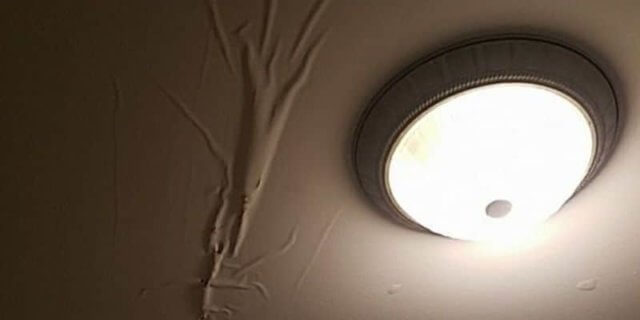 bubbles in the ceiling are caused from water leaking above 