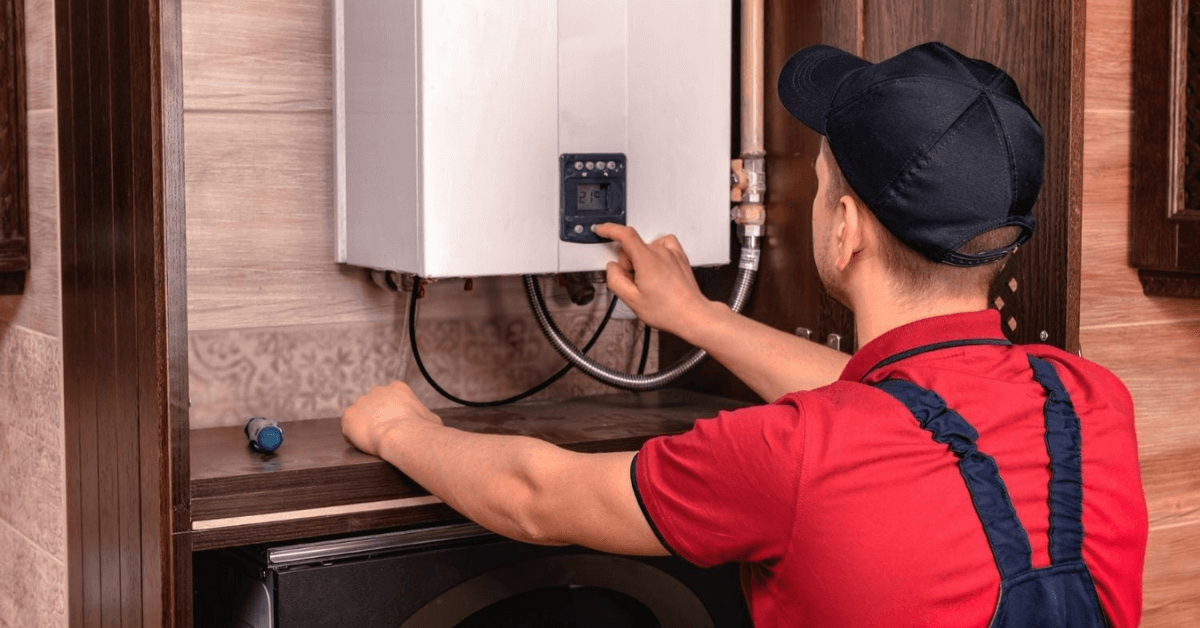 an image of a tankless water heater technician
