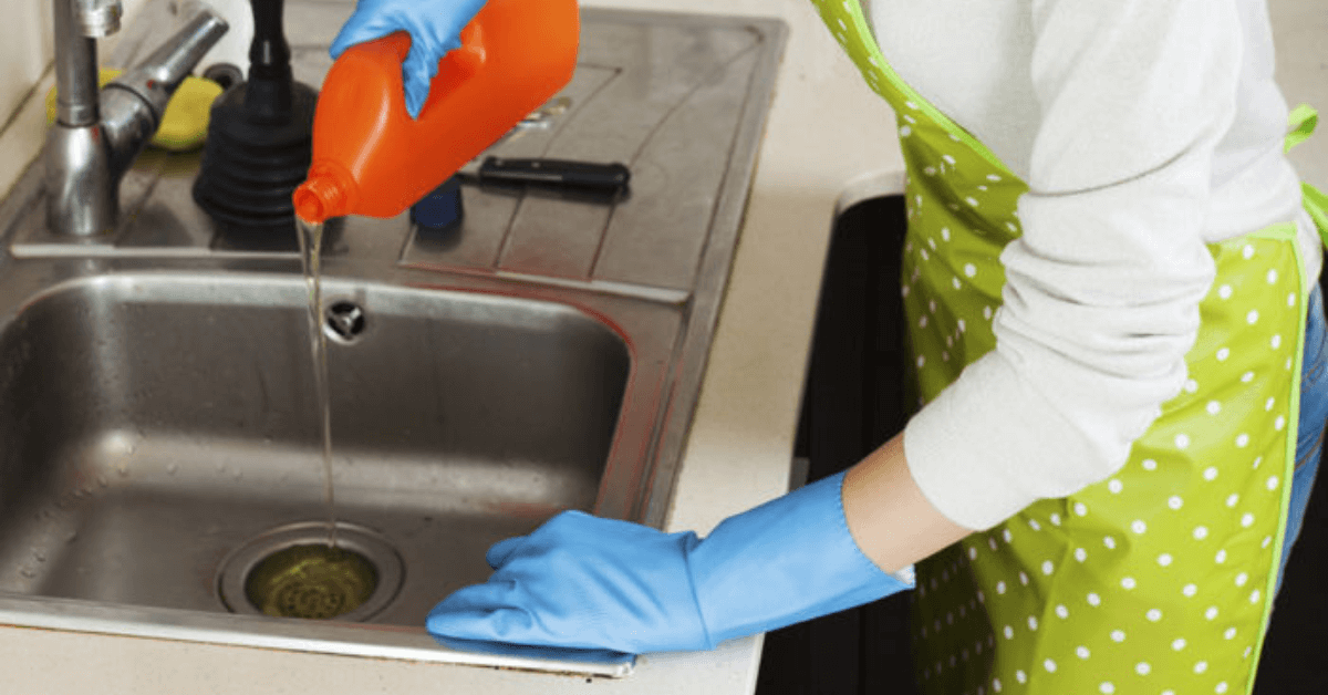 unclogging the kitchen sink with chemical drain cleaner